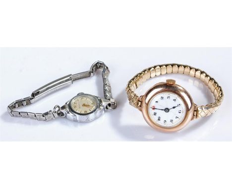 Two ladies watch to include a 9 carat gold example with enamel dial and a stainless steel example with some paperwork (2)