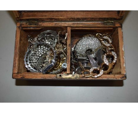A 19th Century mother of pearl inlaid tea caddy containing a mixture of costume jewellery