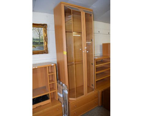 A modern light wood finish display cabinet