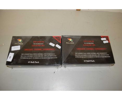 Two boxes of Palmer Titanium golf balls