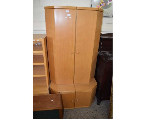A pair of modern light wood finish lounge corner cabinets