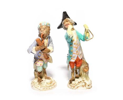 Two Meissen figures from a monkey band (affenkapelle), 19th/20th century, one a bassoonist wearing a turban and a lilac coat 