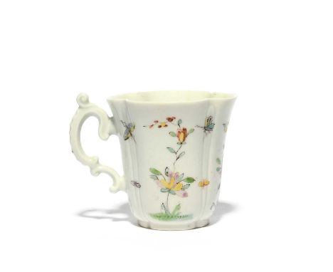 A rare and early Worcester coffee cup, c.1753-54, the quatrefoil form finely painted in famille vert enamels with insects in 