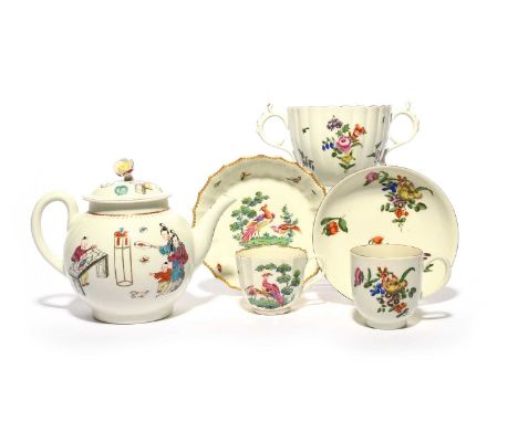 A Worcester teapot and cover and two cups and saucers, c.1760-75, the teapot painted with a Chinese family beside a stand and