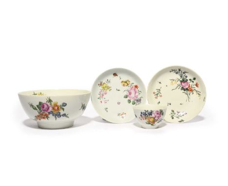 A Worcester teabowl and two saucers, c.1760, decorated in the London atelier of James Giles with sprays of flowers, one sauce