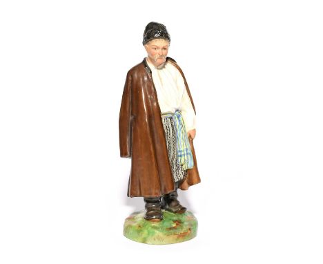 A Russian porcelain figure of a Malorussian man, Imperial Porcelain factory, c.1912-15, from the Peoples of Russia series mod