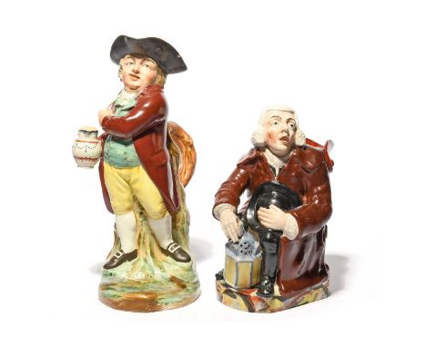 Two Toby jugs, c.1820-30, one a Hearty Good Fellow, standing with a pipe and foaming jug of ale, and a Nightwatchman, seated 