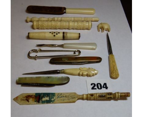 MISC SELECTION OF TURNED 19TH CENTURY IVORY AND BONE BODKIN HOLDERS AND MOTHER OF PEARL BACKED SILVER BLADED FOLDING FRUIT KN