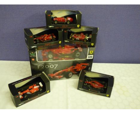 1:24 SCALE RADIO CONTROL F2007 FERRARI AND FIVE 1:43 SCALE F1 FERRARI IN BOX 