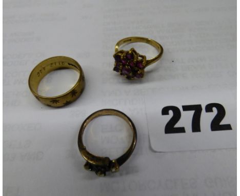 9CT GOLD RUBY CLUSTER DRESS RING (ONE STONE MISSING) 9CT GOLD WEDDING BAND AND A YELLOW METAL CROSSOVER RING 8.1G APPROX OVER