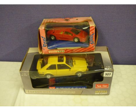 EUROPEAN COLLECTIBLES 1:18 SCALE METAL DIECAST 1981 FORD ESCORT AND A BOXED TONKA POLISTILL CAR