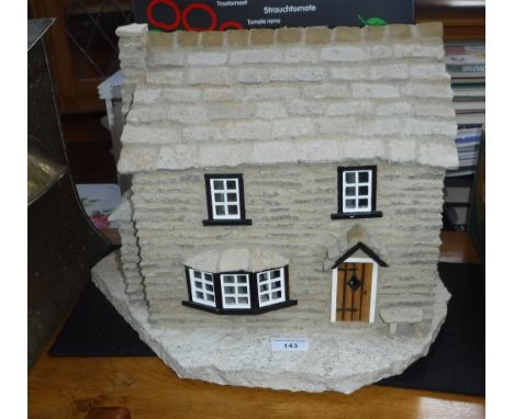 A PURBECK STONE MODEL OF A COTTAGE