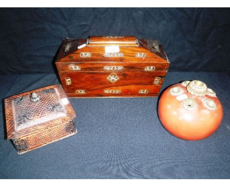 A REGENCY ROSEWOOD AND MOTHER OF PEARL INLAID TEA CADDY  an embossed metal box and an incense stand (3)