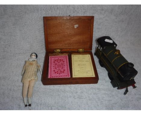 A MECCANO 00 GAUGE ENGINE NO. 9319, a cased Bezique game and a ceramic headed miniature doll 