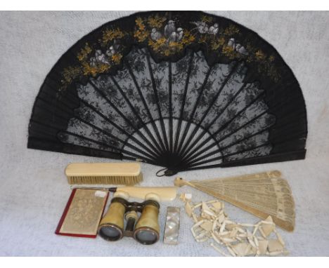 A 19TH CENTURY PIERCED IVORY FAN with initials 'NA' in the decoration and a collection of other late 19th and early 20th cent