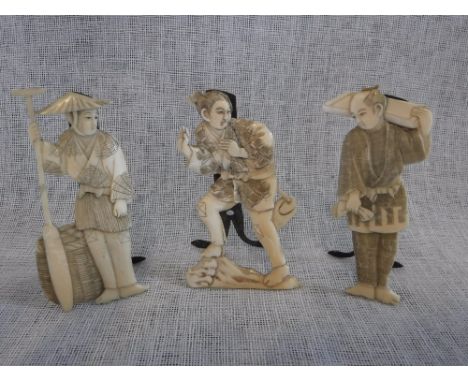 A SET OF THREE JAPANESE IVORY FIGURAL MENU CARD HOLDERS, Meiji 