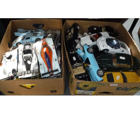 A QUANTITY OF MODEL ICONS CAR MODELS including Aston Martin, Jaguar and others