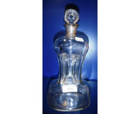 A GLASS DECANTER with silver collar