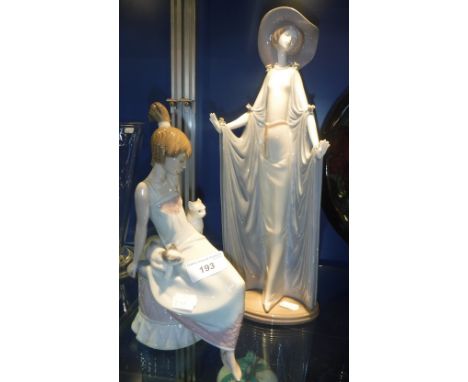 A LLADRO FIGURE OF A WOMAN WITH TWO CATS and another