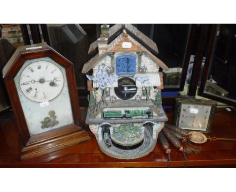 A 19TH CENTURY AMERICAN MANTEL CLOCK, a modern resin 'Railway' clock and a 1960s mantel clock (3)