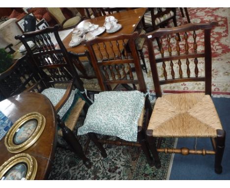 A SET OF EIGHT LANCASHIRE RUSH-SEATED CHAIRS with bobbin-turned backs and turned front legs and stretchers