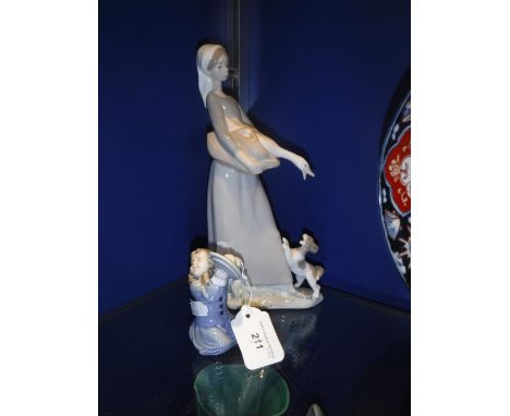 A LLADRO FIGURE OF A WOMAN HOLDING A GOOSE and a Royal Copenhagen figure of a young girl