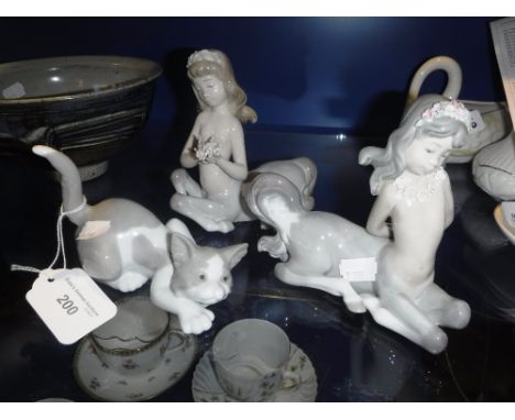 LLADRO: TWO HALF CHILD HALF HORSE FIGURES and a cat 