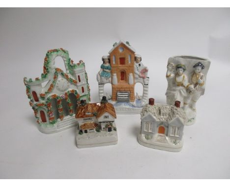 A small collection of Victorian and later Staffordshire figures,  to include a folk art type example in a Pratt ware palette,
