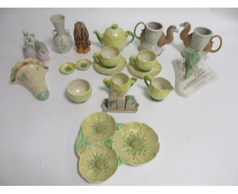 A Carlton Ware yellow buttercup teapot,  height 11cm, together with two coffee pots in the form of camels, a Burleigh Ware wa