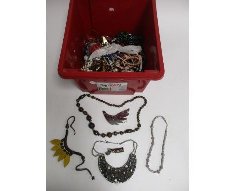 A large quantity of costume jewellery,  to include a necklace of ceramic beads with transfer printed flowers, a collar style 