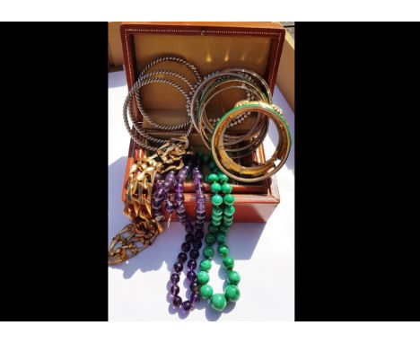 A quantity of costume jewellery, including various beads in amethyst and malachite, one with Chinese silver clasp the other w