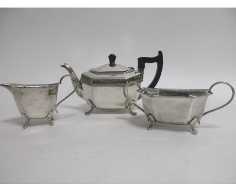 An Art Deco silver plated three piece tea set,  consisting of teapot, sugar bowl and milk jug, marked EPNS, height of teapot 