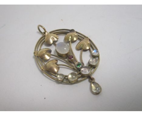 An early 20th Century yellow metal moonstone and gem set oval pierced pendant,  with stylised tulip flowers, and sinuous stem