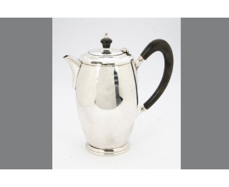 A 1960s silver hot water pot by Elkington &amp; Co, Birmingham 1962, Art Deco style with applied black handle and finial, hol