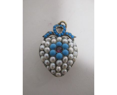 An early 20th Century pearl,  turquoise and ruby heart pendant, the heart encrusted with half pearls centred with a mixed rou