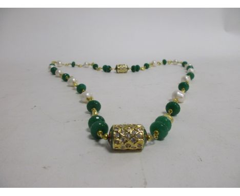 A jade and cultured pearl silver gilt necklace, 43cm long
