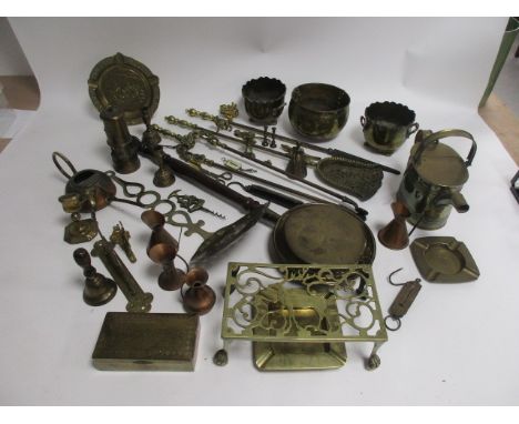 A group of 20th Century metalwares, to include a stag design stand, Welsh reproduction miners lamp, chestnut sieve, watering 