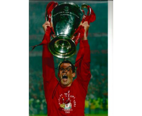 Football Jamie Carragher 12x8 signed colour photo pictured lifting the Champions League trophy for Liverpool in 2005. James L