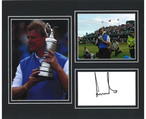 Golf Ernie Els 12x10 mounted signature piece includes two colour photos holding the claret jug and a signed album page mounte