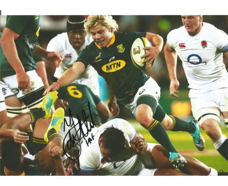 Rugby Faf de Klerk 12x8 signed colour photo pictured playing for South Africa against England. Good Condition. All signed pie