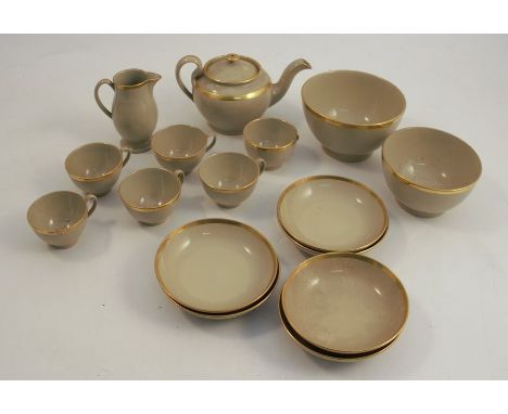 A 19th century Wedgwood drab ware miniature tea set, comprising tea pot, milk jug, sugar bowl, slop bowl, six saucers and six