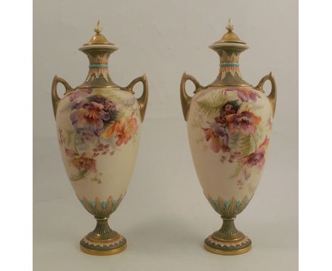 A pair of Royal Worcester gilded ivory covered vases, decorated with flowers, shape number 1921, circa 1899, height 13.5insCo