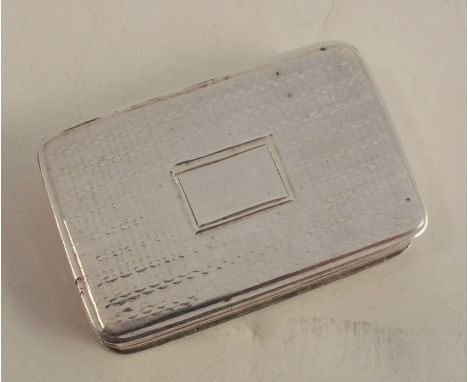 A Georgian silver vinaigrette, of rectangular form with engine turning, the pierced grill decorated with flowers, Birmingham 