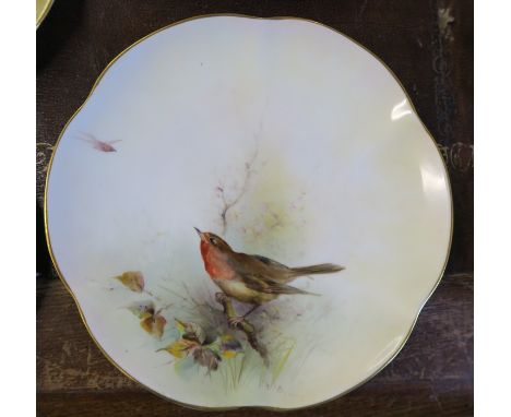 A Royal Worcester plate, decorated with a robin by James Stinton, circa 1912, diameter 8.5insCondition Report:  Crazed otherw