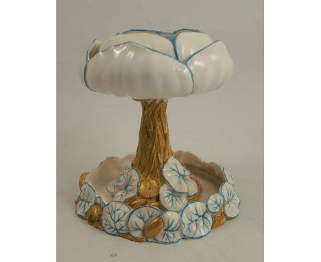 A Royal Worcester centre piece, formed as a lily flower and pads, with blue veins to a white ground, with gilt stem and buds,