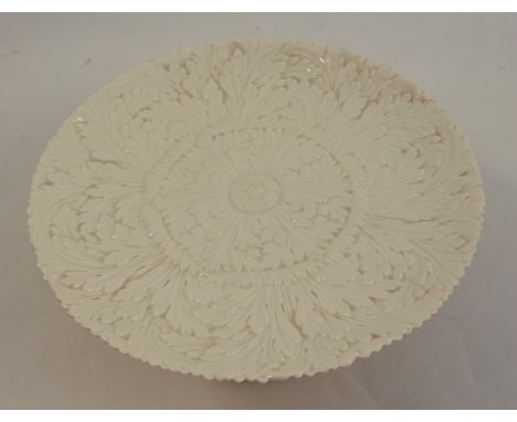 A Locke &amp; Co blanc de chine moulded porcelain tazza, the top modelled as a flower head, the based impressed Locke &amp; C