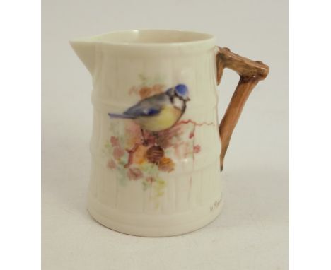 A Royal Worcester rustic jug, decorated with a blue tit by William Powell, 1924, height 2.5insCondition Report:  Inspected an