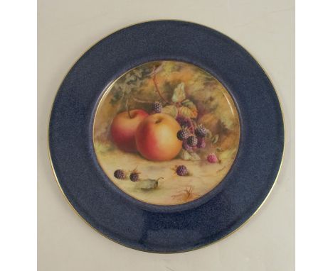 A Royal Worcester plate, decorated with a central panel of fruit by H Everett, to a Sabrina blue border, dated 1922, diameter