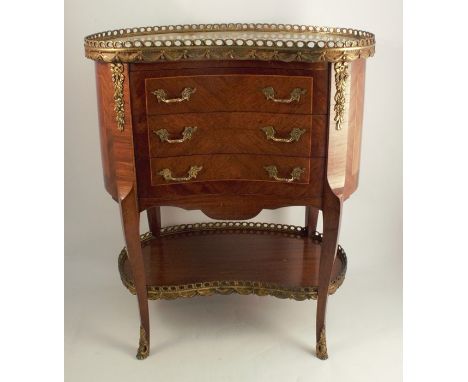 A continental marble topped chest of drawers, with three drawers, raised on slender legs, the shelf below with gilt gallery, 