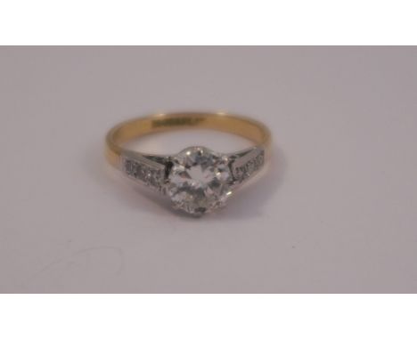 A diamond single stone ring, the brilliant cut, measuring approximately 6mm by 3.3mm, calculated as weighing approximately 0.